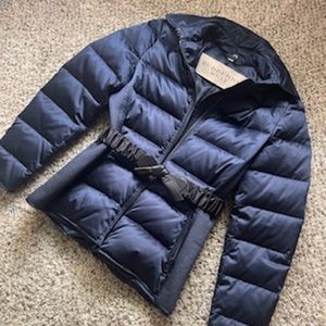 Woman’s authentic Burberry coat, size 4. Brand new. Never worn!